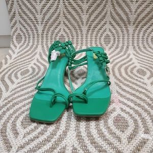 Brand new green strappy heels .size 7